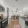 a kitchen with a stove and microwave