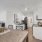 a kitchen with white cabinets