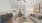 spacious living room with ceiling fan, dining nook and kitchen 