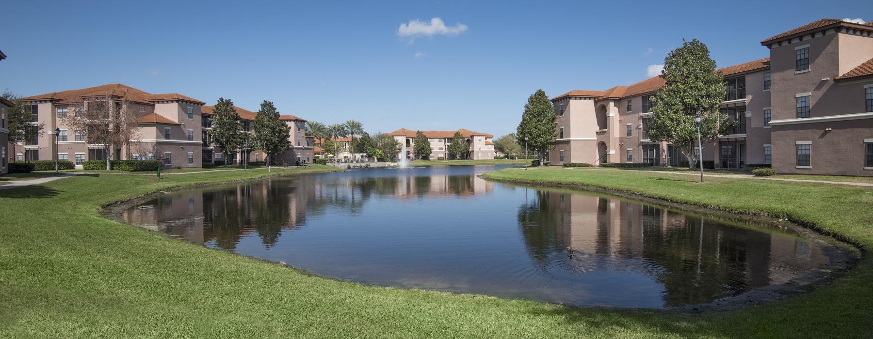 a body of water with buildings around it